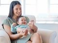 Whos cute toes are these. a mother bonding with her baby at home.