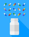 Whtie pill bottle and a variety of colorful pills, capsules