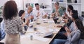 Why be good alone when you can be better together. a group of businesspeople clapping during a meeting in a modern Royalty Free Stock Photo