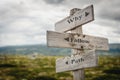 why follow path text engraved on old wooden signpost outdoors in nature Royalty Free Stock Photo