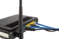 WI-FI router, back panel with connected wires Royalty Free Stock Photo