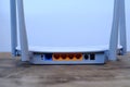 Wi-Fi router output ports close-up, modern wireless Router with four non-removable external antennas for better search and signal Royalty Free Stock Photo