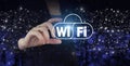 Wi Fi wireless concept. Hand hold digital hologram Wi Fi sign on city dark blurred background. Free WiFi network signal technology Royalty Free Stock Photo