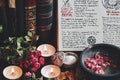 Wiccan witch altar with an open book of shadows with hand written spell in it, ready for spell casting Royalty Free Stock Photo