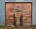 Wichita Indian woman mural by tattoo artist Rose Rodriguez for the Wild West Mural Fest 2020 in West Dallas, Texas.