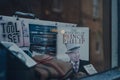 The Wicked Wit of Prince Philip book on a window display of a shop in Stow-on-the-Wold, Cotswolds, UK, selective focus