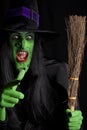 The wicked witch and her broomstick. Royalty Free Stock Photo
