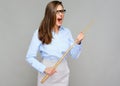 Wicked woman teacher screams, holding pointer wand.