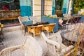 Wicker armchair, rattan wicker chairs and tables.Outdoor cafe on street, sidewalk restaurant of Georgian cuisine. Cafe summer Royalty Free Stock Photo