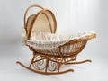 A wicker baby cradle with white lace Royalty Free Stock Photo