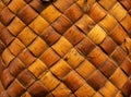 Wicker background from birch bark strips. Natural material. Texture of inner layers of birch bark of different colors Royalty Free Stock Photo