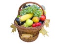 Wicker basket with autumn fruit and vegetables Royalty Free Stock Photo