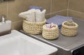 Wicker basket with blue and white towel