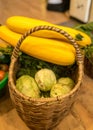 Wicker basket with cabbage and courgettes, harvest time, autumn