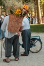 Wicker Basket Carried over the Shoulder of Countryman Royalty Free Stock Photo