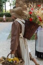 Wicker Basket Carried over the Shoulder of Young Countrywoman wi