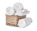 Wicker basket with clean soft towels on white background Royalty Free Stock Photo