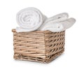 Wicker basket with clean soft towels on white background Royalty Free Stock Photo