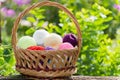 Wicker basket with colorful balls of yarn Royalty Free Stock Photo