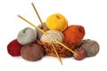 Wicker basket with different balls of woolen knitting yarns and needles on white background Royalty Free Stock Photo