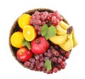 Wicker basket with different fruits on white background, top view Royalty Free Stock Photo