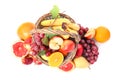 Wicker basket with different fruits on white background, top view Royalty Free Stock Photo