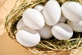 Wicker basket with farm natural white eggs.