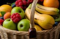 Fresh and colorful fruits in a wicker basket on a dark background Royalty Free Stock Photo