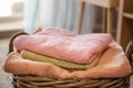 Wicker basket with folded clean towels Royalty Free Stock Photo