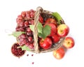 Wicker basket with fresh fruits and berries on white background, above view Royalty Free Stock Photo