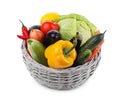 Wicker basket with fresh ripe vegetables and fruit on white background Royalty Free Stock Photo