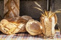 Wicker basket full of breads Royalty Free Stock Photo