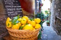 Wicker basket full of lemons on the italian street Royalty Free Stock Photo