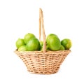 Wicker basket full of multiple ripe limes Royalty Free Stock Photo