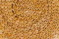 Wicker basket or interior decor close-up. The texture of weaving in a circle Royalty Free Stock Photo