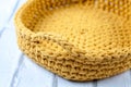 Crochet basket made of yellow thread