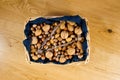 Wicker basket of nuts on tartan Royalty Free Stock Photo