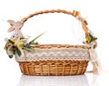 Wicker basket with original floral decor with natural components and a wooden hare Royalty Free Stock Photo