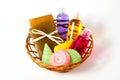 Basket with soap, gel and other accessories for taking a bath and shower on a white background Royalty Free Stock Photo