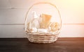 Wicker basket with spa treatments on table. Sun flare Royalty Free Stock Photo