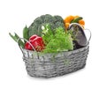 Wicker basket with various fresh vegetables on white background Royalty Free Stock Photo