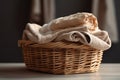 Wicker basket with washed dry linen close-up. Washday Royalty Free Stock Photo