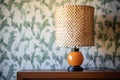 wicker bedside lamp casting patterned shadows on wall