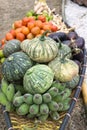 Wicker boat carrying fruit and vegetable