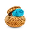 Wicker box of yellow color with dark blue thread Royalty Free Stock Photo