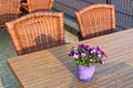 Wicker cafe tables and chairs Royalty Free Stock Photo