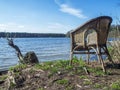 Wicker chair at the Lake Flaken wide angle view Royalty Free Stock Photo