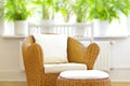 wicker chair ottoman white pillows