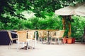 Wicker chairs. Cafe in the street Royalty Free Stock Photo