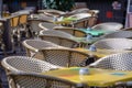 Wicker chairs and colorful tables in the outdoor cafe. Royalty Free Stock Photo